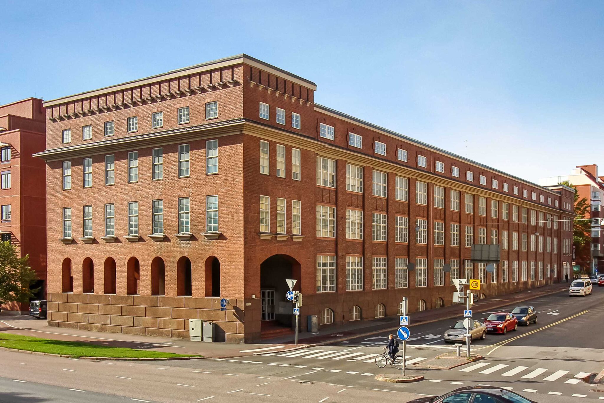 Picture showing the beautiful old industrial style red brick building in which Hive Helsinki is located