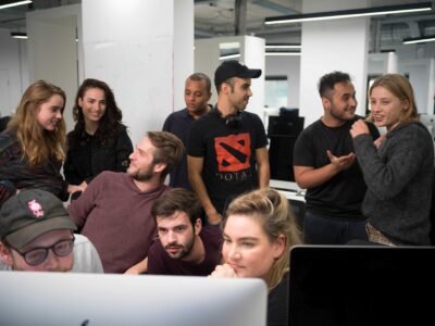 A group of Hive Helsinki students working together on a coding project