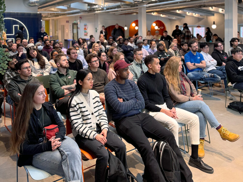 Selection Sprint applicants seated and listening during a group introduction session at Hive